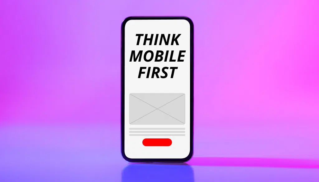 Image of a smartphone on a purple background with the words "think mobile first" on its screen, for mobile-first website design